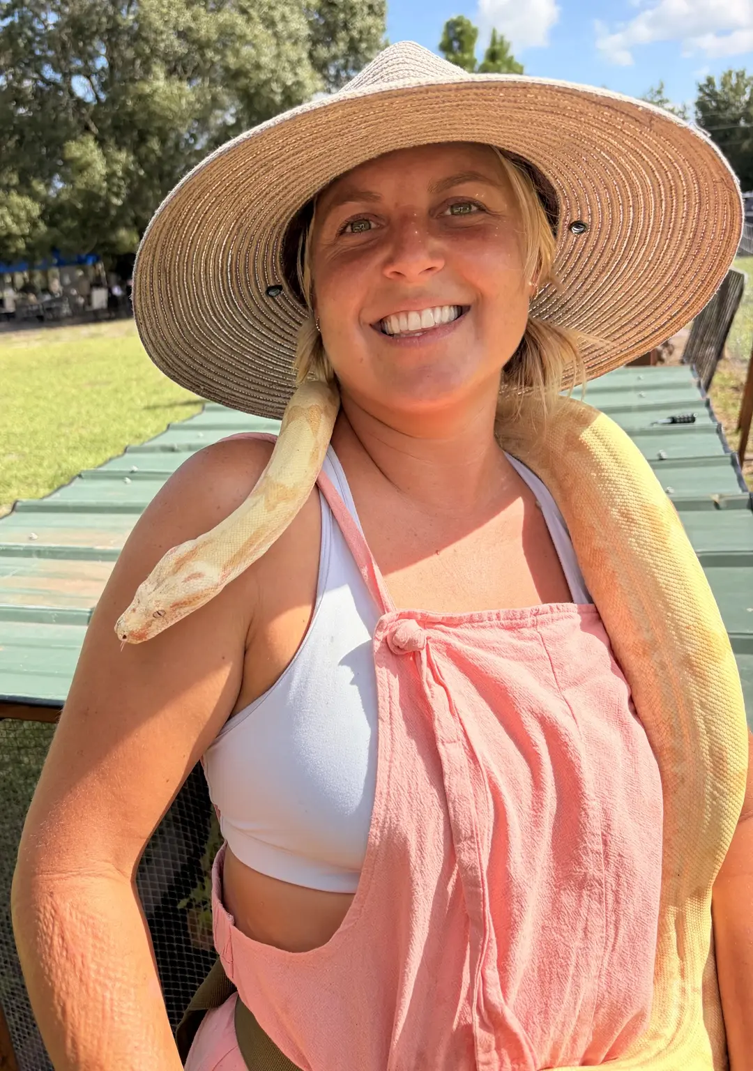 Country Critters team member holding a friendly snake